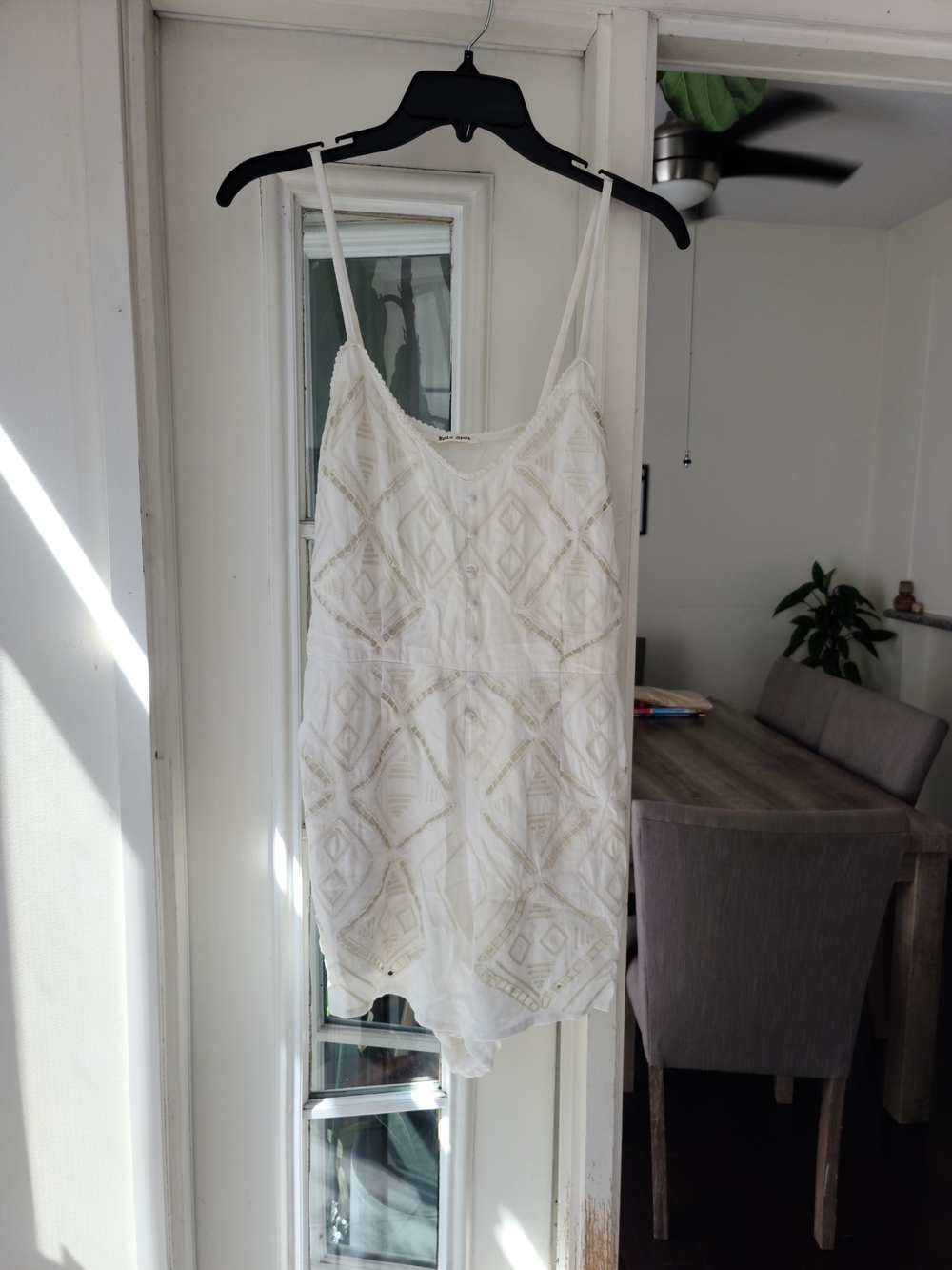 White Embroidered Sleeveless Romper with Geometric Detail